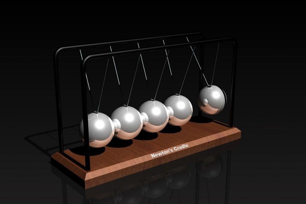 Newton’s Cradle with swinging silver balls in motion, symbolising the power of momentum over temporary motivation